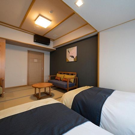 Отель Kyoto Umekoji Kadensho Экстерьер фото A room at the hotel