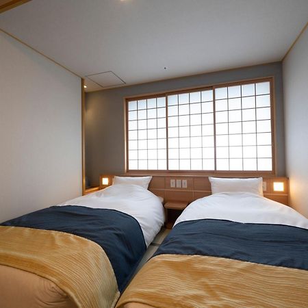 Отель Kyoto Umekoji Kadensho Экстерьер фото A room at the hotel