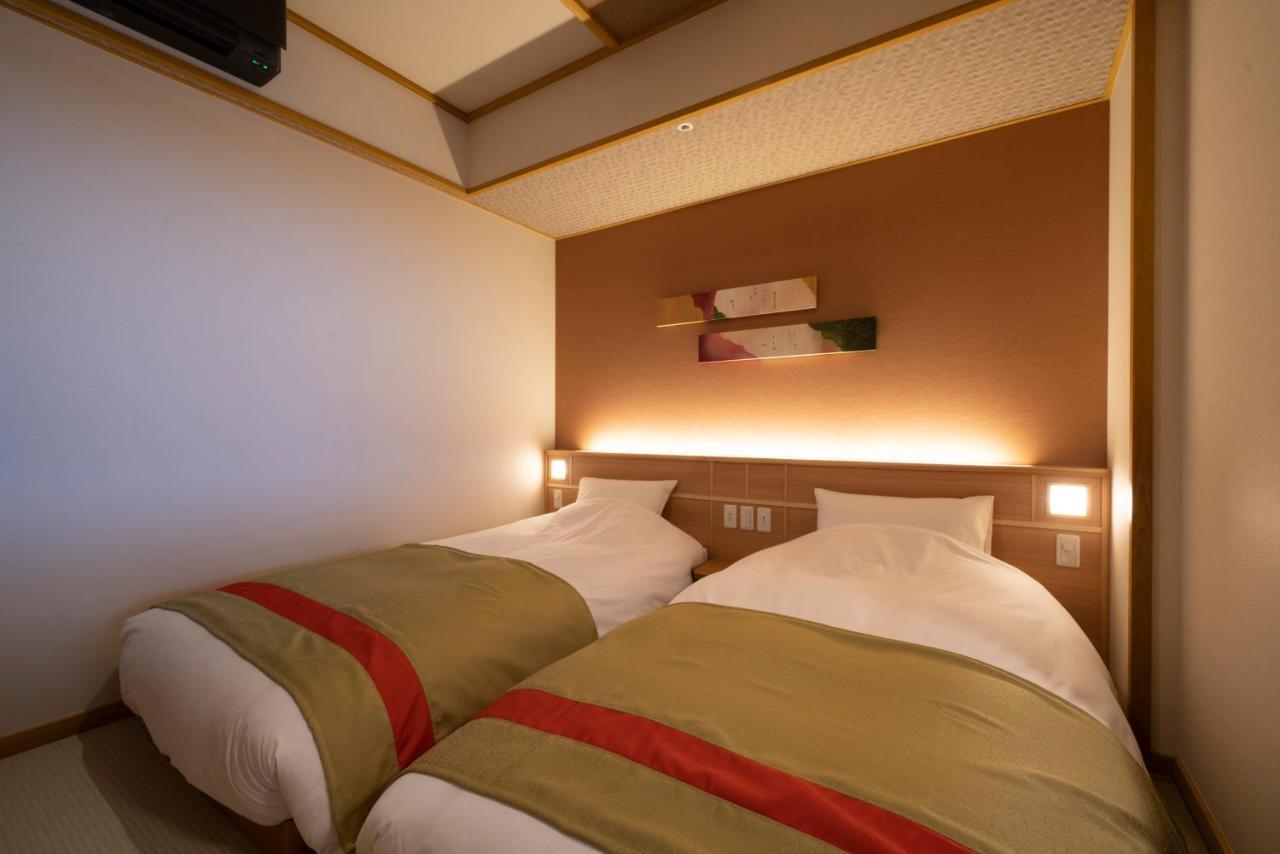 Отель Kyoto Umekoji Kadensho Экстерьер фото A room at the hotel