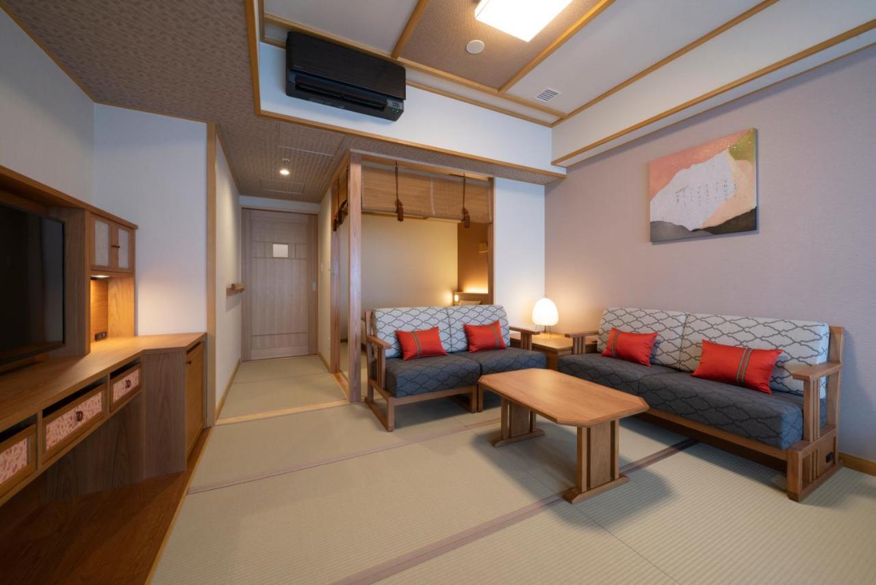 Отель Kyoto Umekoji Kadensho Экстерьер фото A Japanese-style room at the hotel