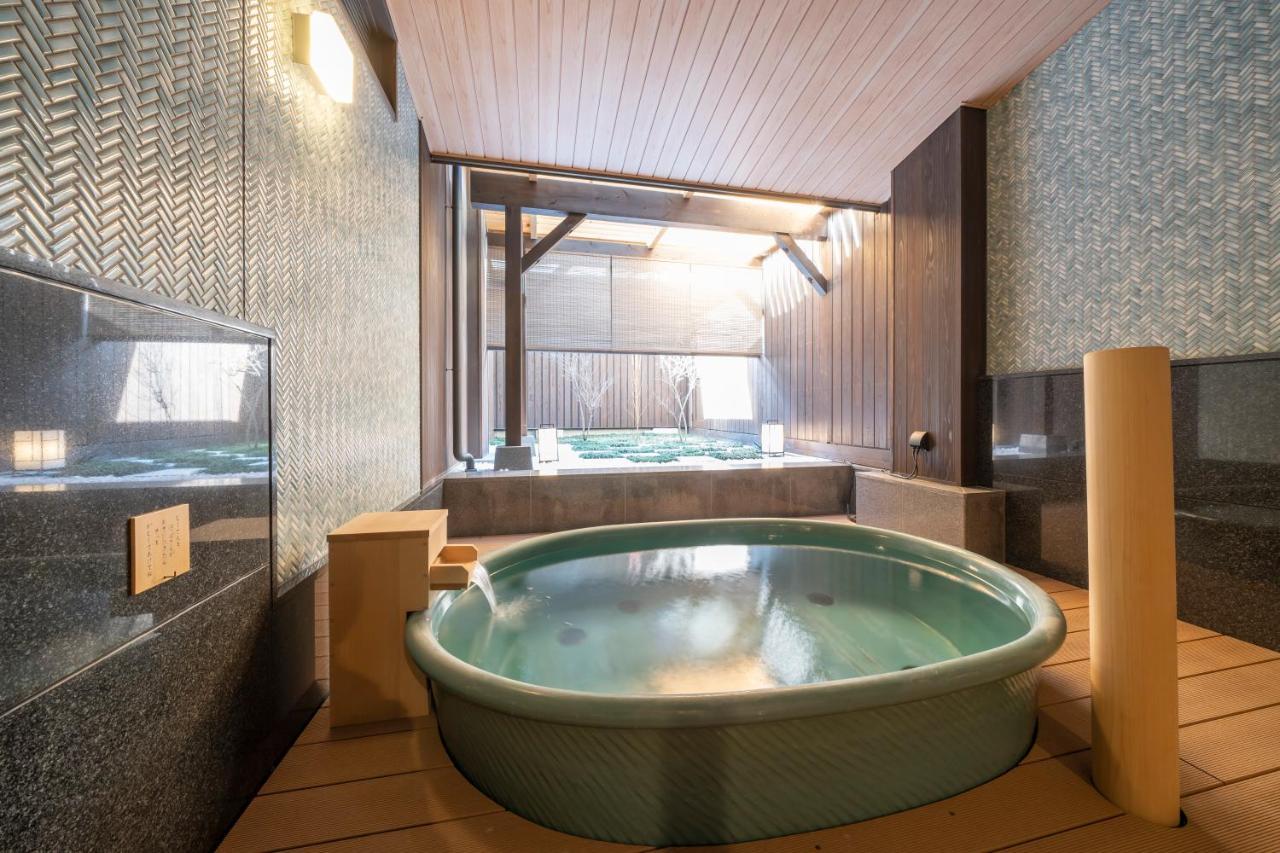 Отель Kyoto Umekoji Kadensho Экстерьер фото A modern onsen