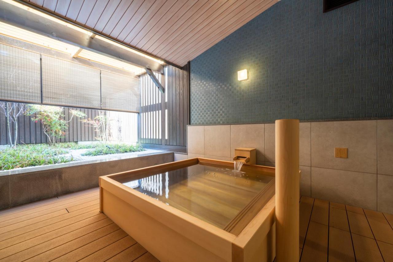Отель Kyoto Umekoji Kadensho Экстерьер фото A modern onsen bath